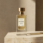 Dark luxury scene with Nichy perfume featuring oud and amber notes in egypt